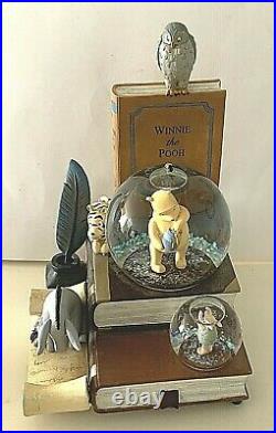 Disney's 80 years of Classic Winnie The Pooh Book End Snow Globe Music box MINT