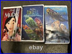 Walt disney classics collection vhs tapes Mulan, Atlantis, and Fantasia 2000